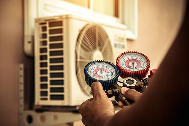 Professional Hvac technician working in Delta, UT